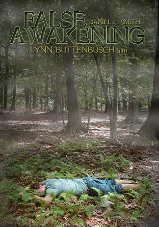 Cover of the film, “False Awakening.” A young man wearing a t-shirt and jean shorts lies face-down on the ground in the woods.